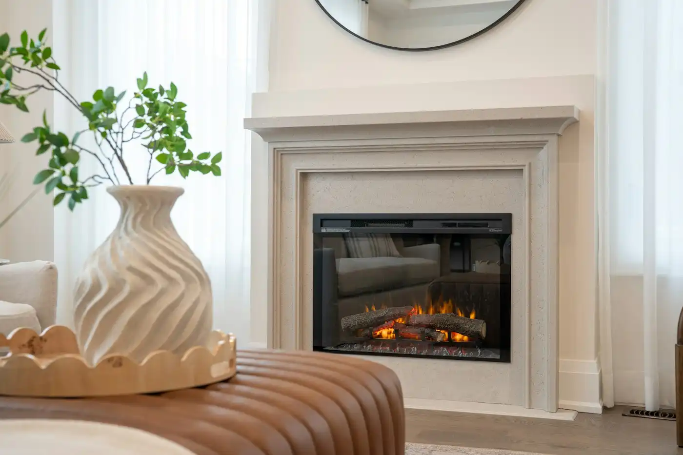 Living room with a fireplace and a vase