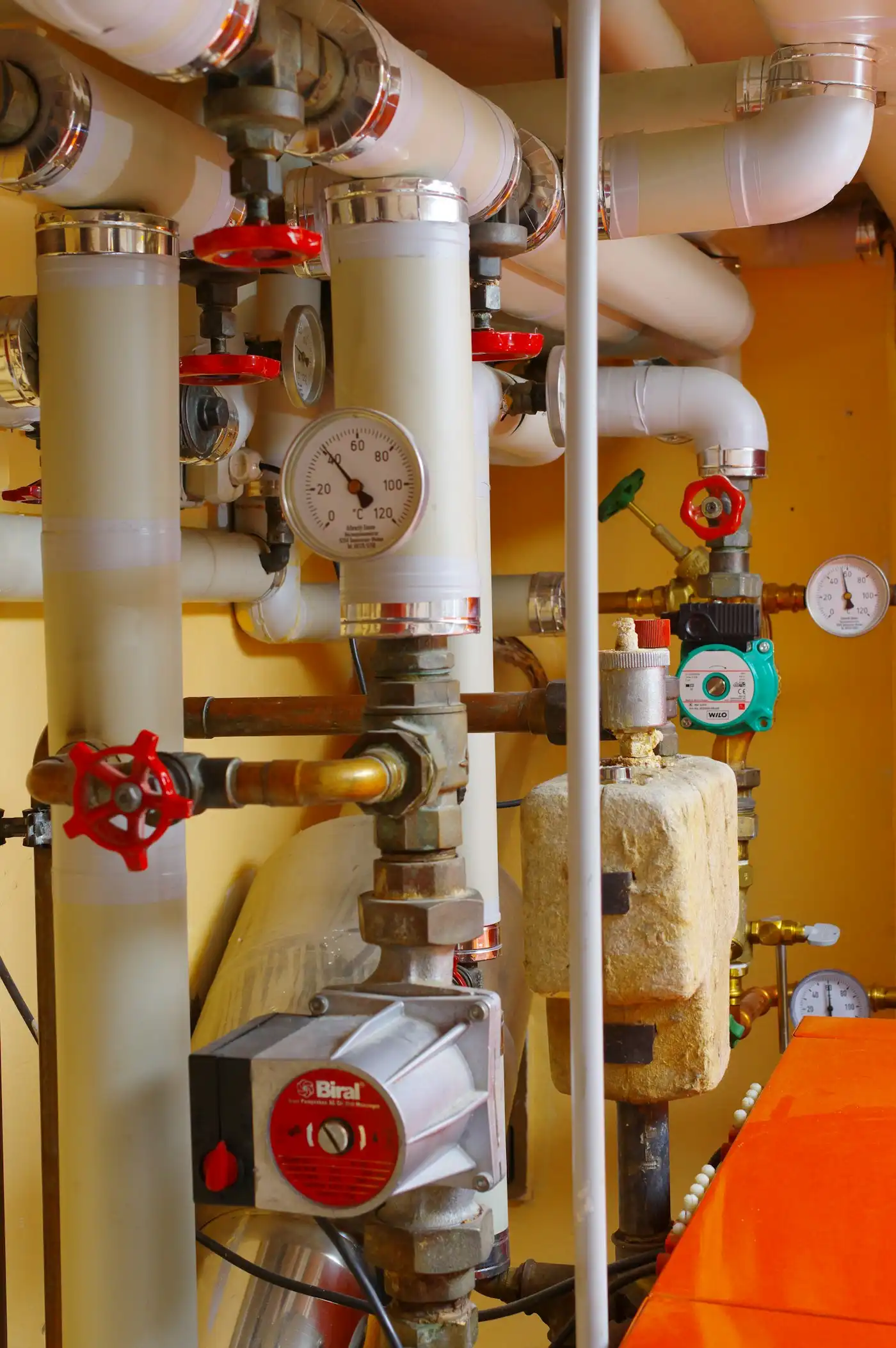 Heating plant room with pipes and gauges