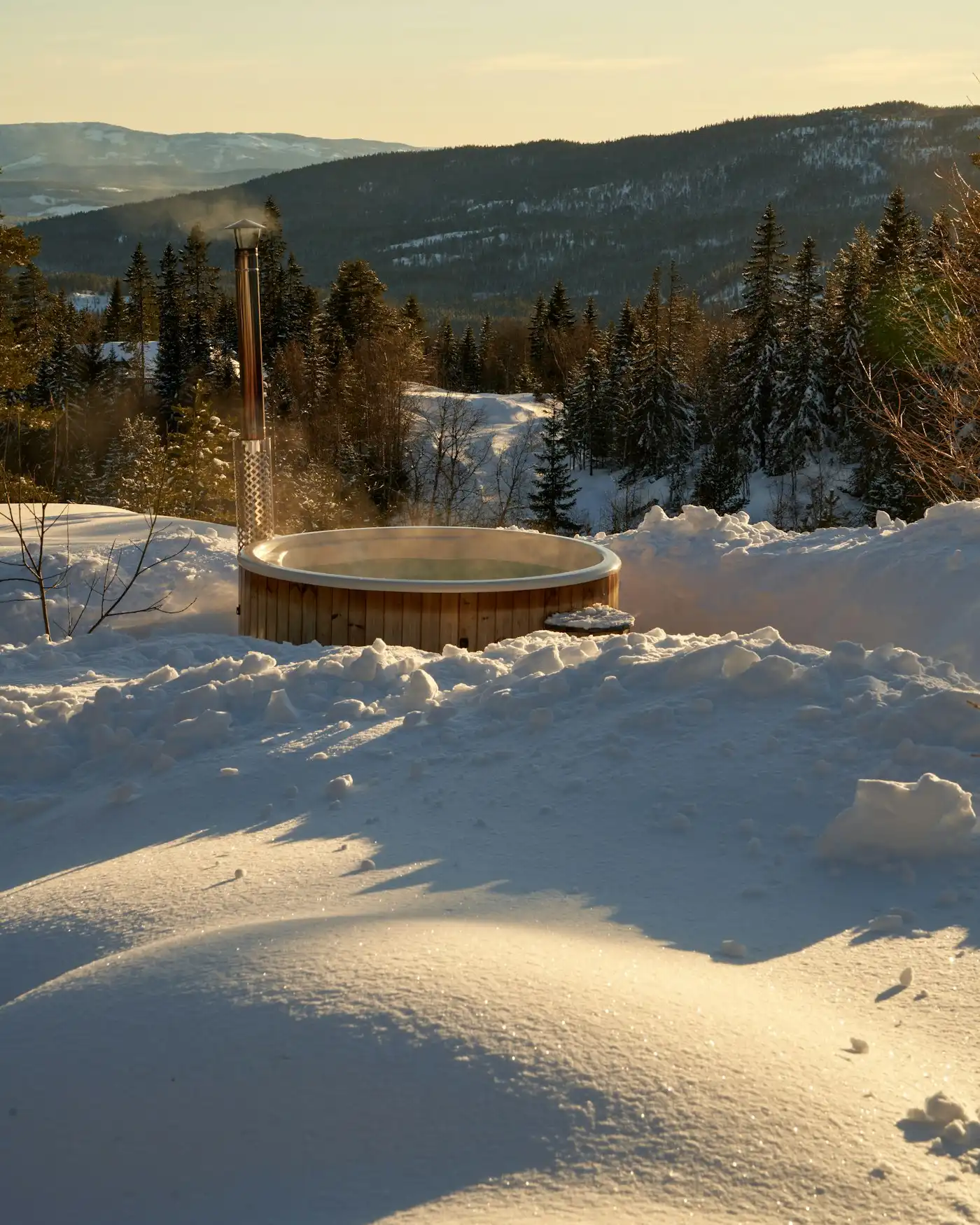 Hot tub in a snowy landscape