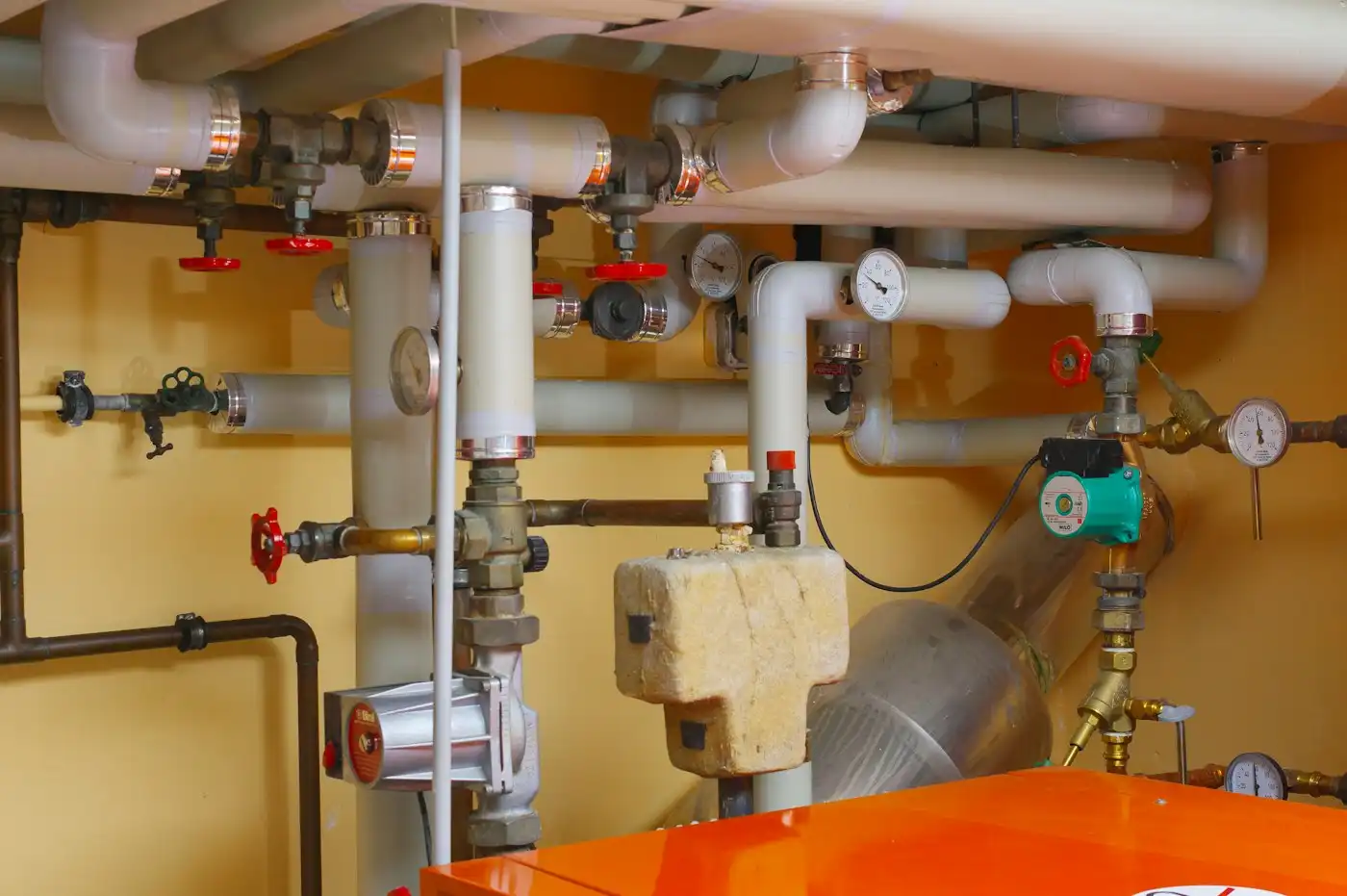 Pipes and valves in a plant room