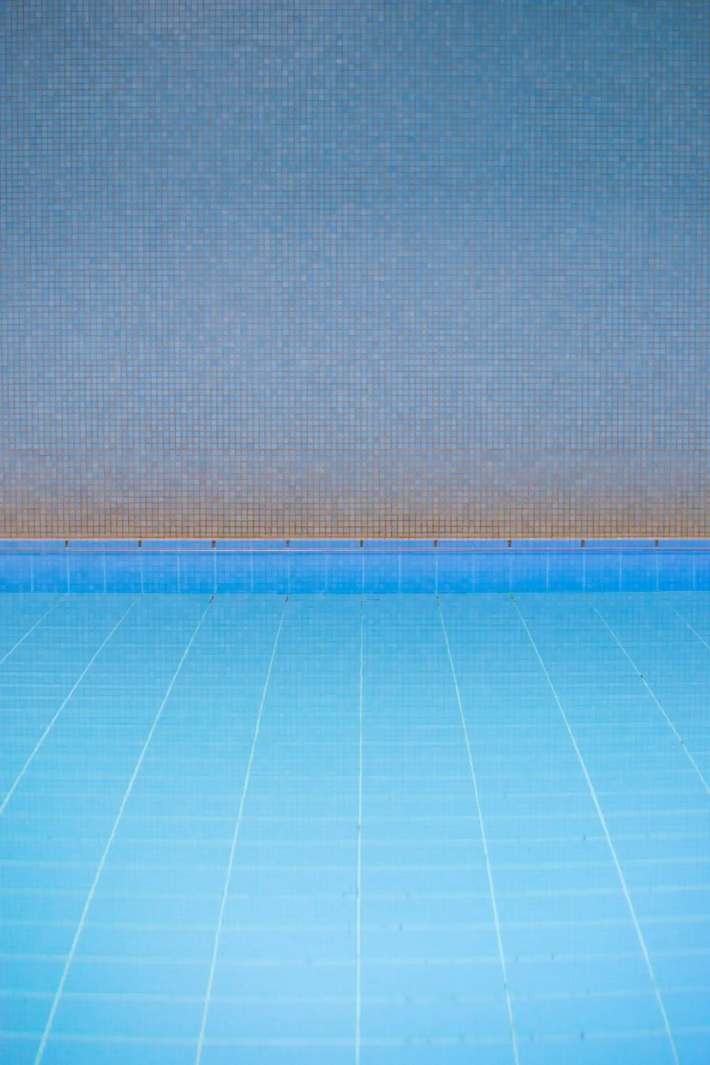 Pool with a blue tiled floor