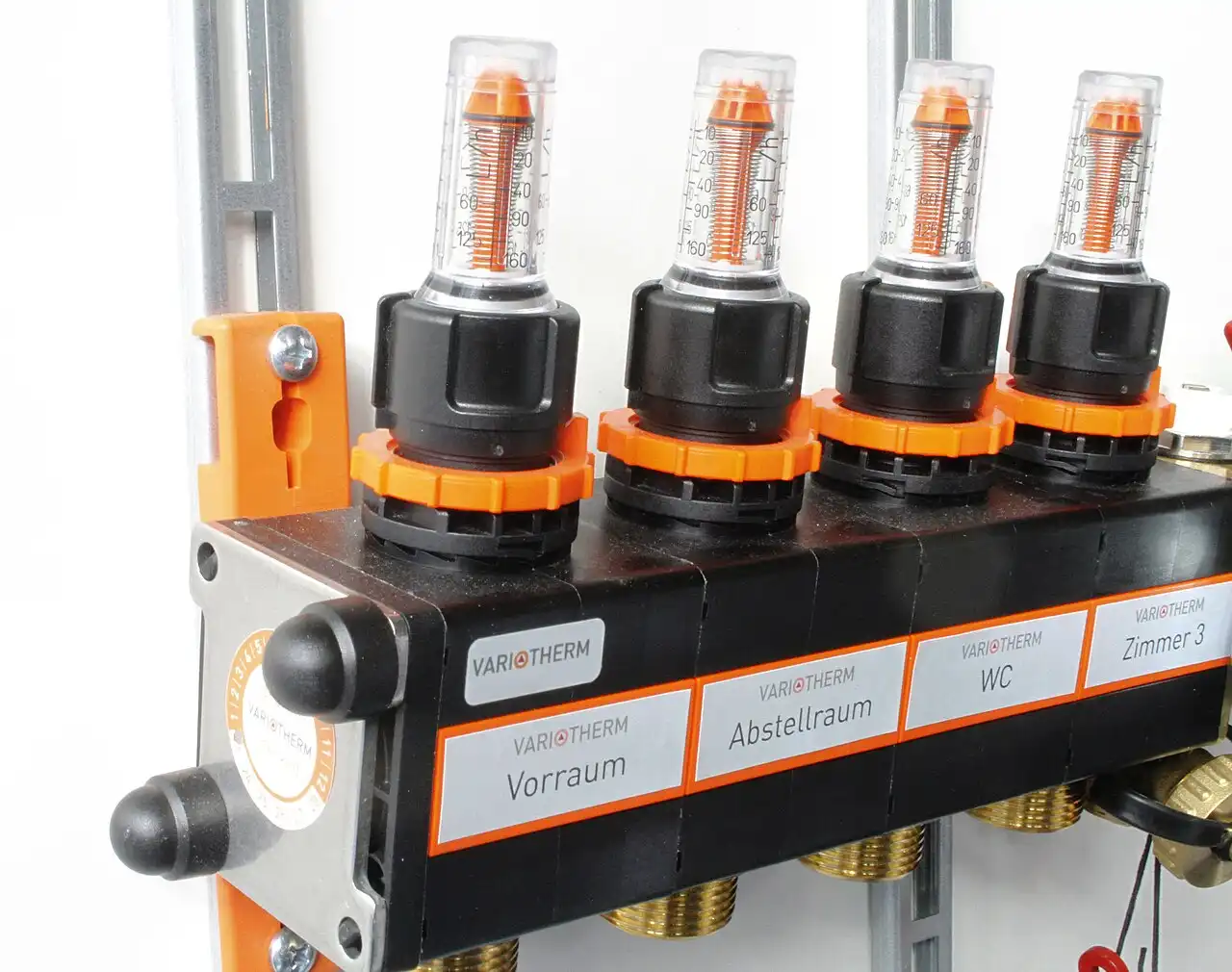 Underfloor heating manifold on a wall